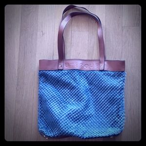 Uterque leather and fur perforated tote